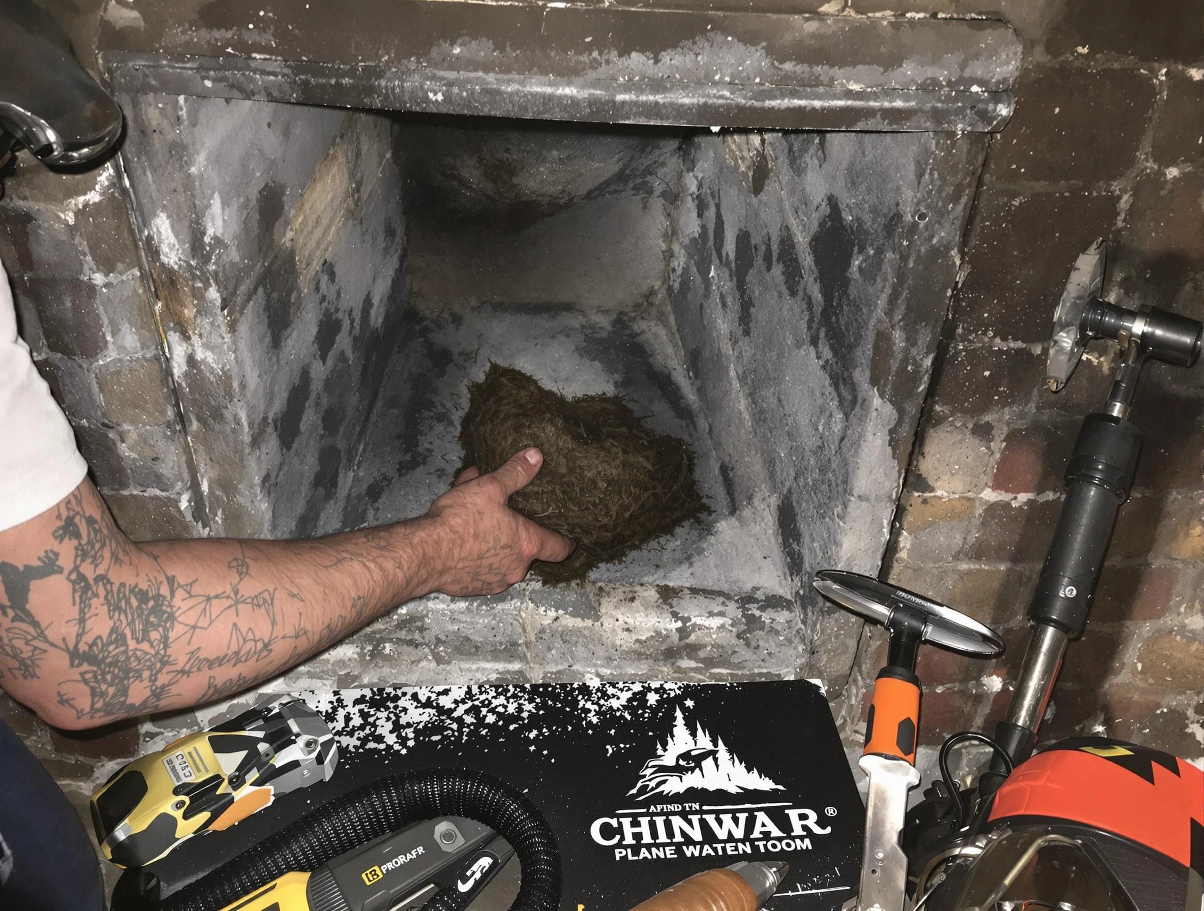 Stockbridge Chimney Sweep safely removing debris and screening chimney in Stockbridge, GA