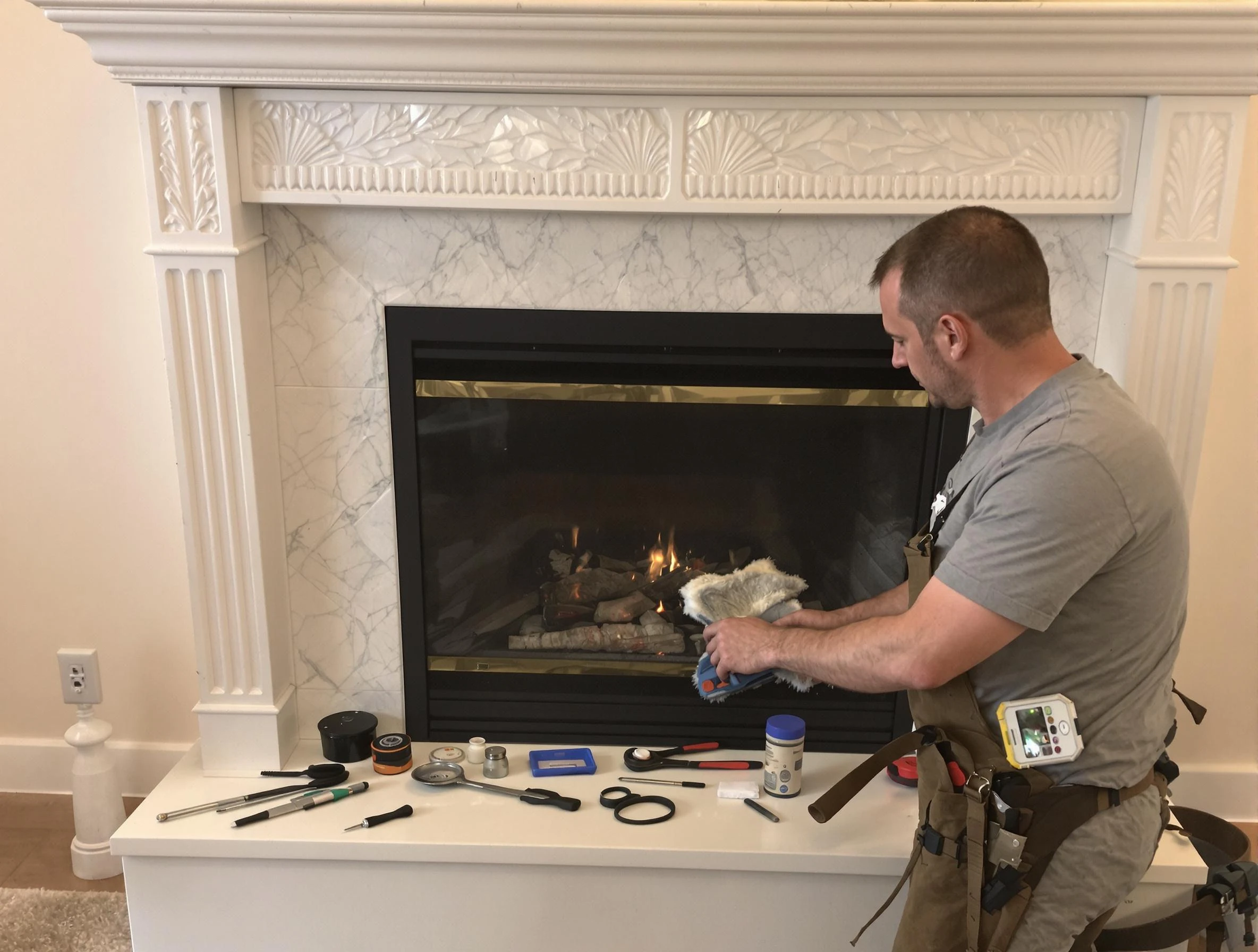 Stockbridge Chimney Sweep performing fireplace maintenance in Stockbridge, GA